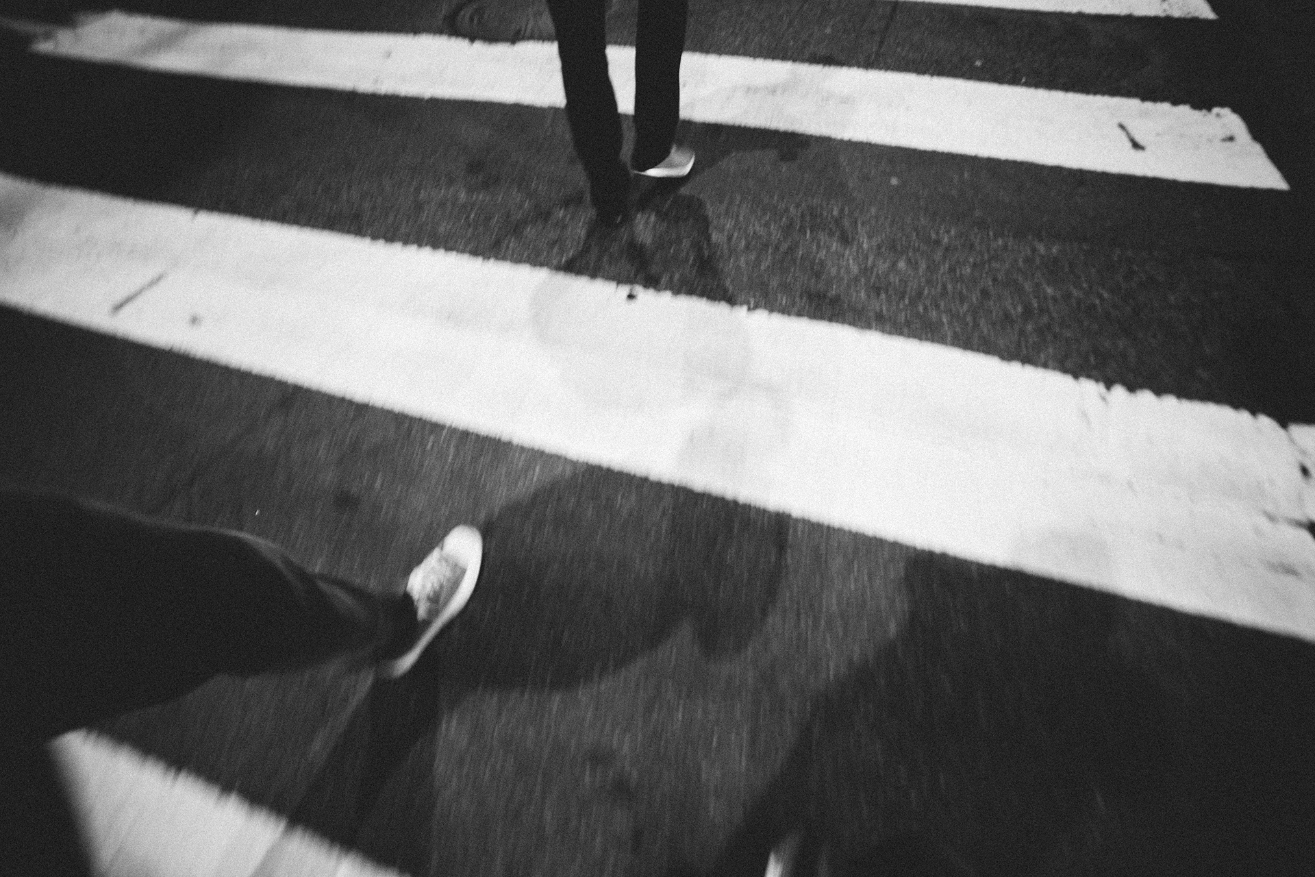 man crossing street